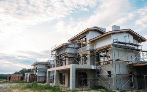 Residential buildings under construction with scaffolding
